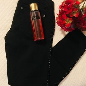 Skinny black jeans with studs